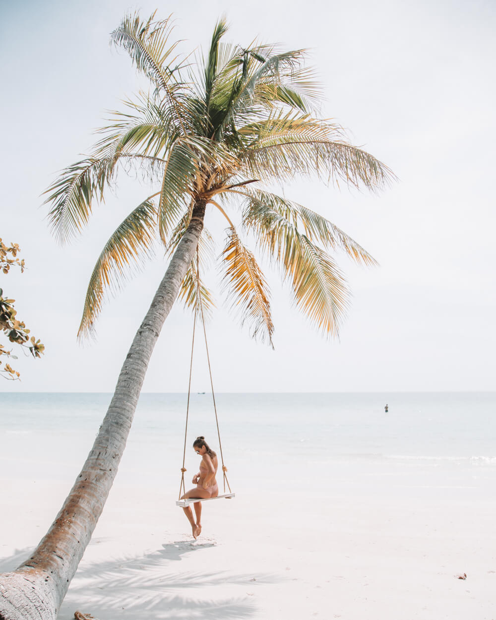 Hanging out on a Palm tree beach swing in the Bahamas